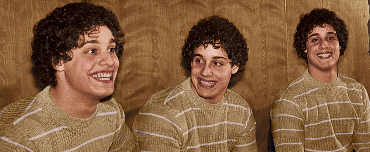 THREE IDENTICAL STRANGERS